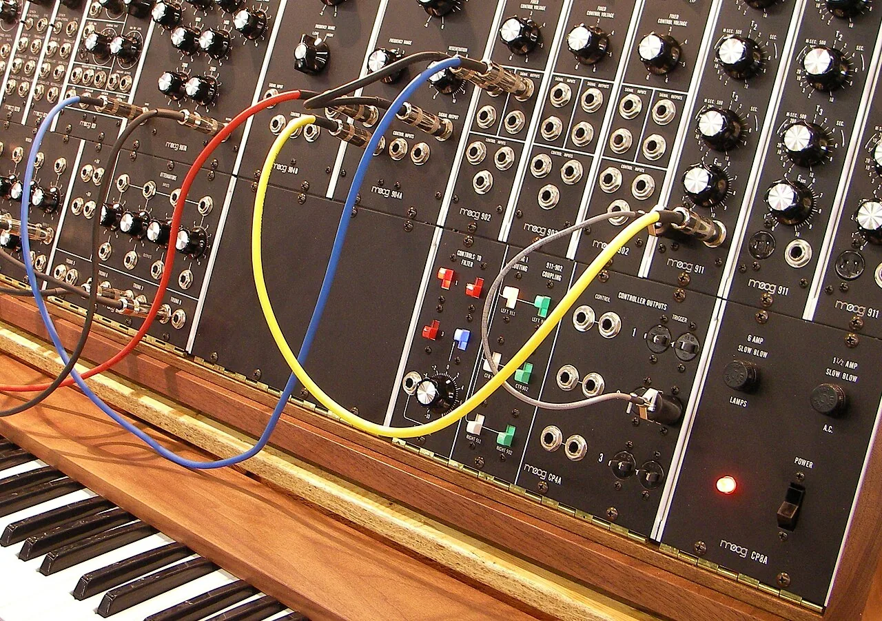 Modular synthesizer with patch cables, knobs, and signal controls